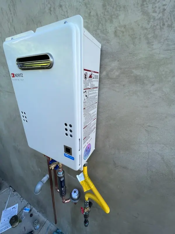 Tankless water heater installation for Woodstone homes